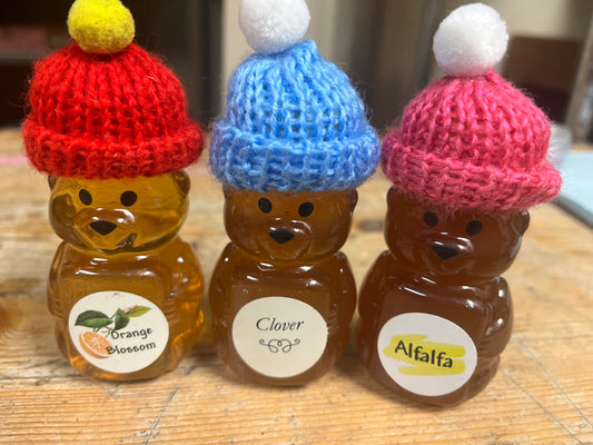 (One) Small honey bear with a knit beanie!